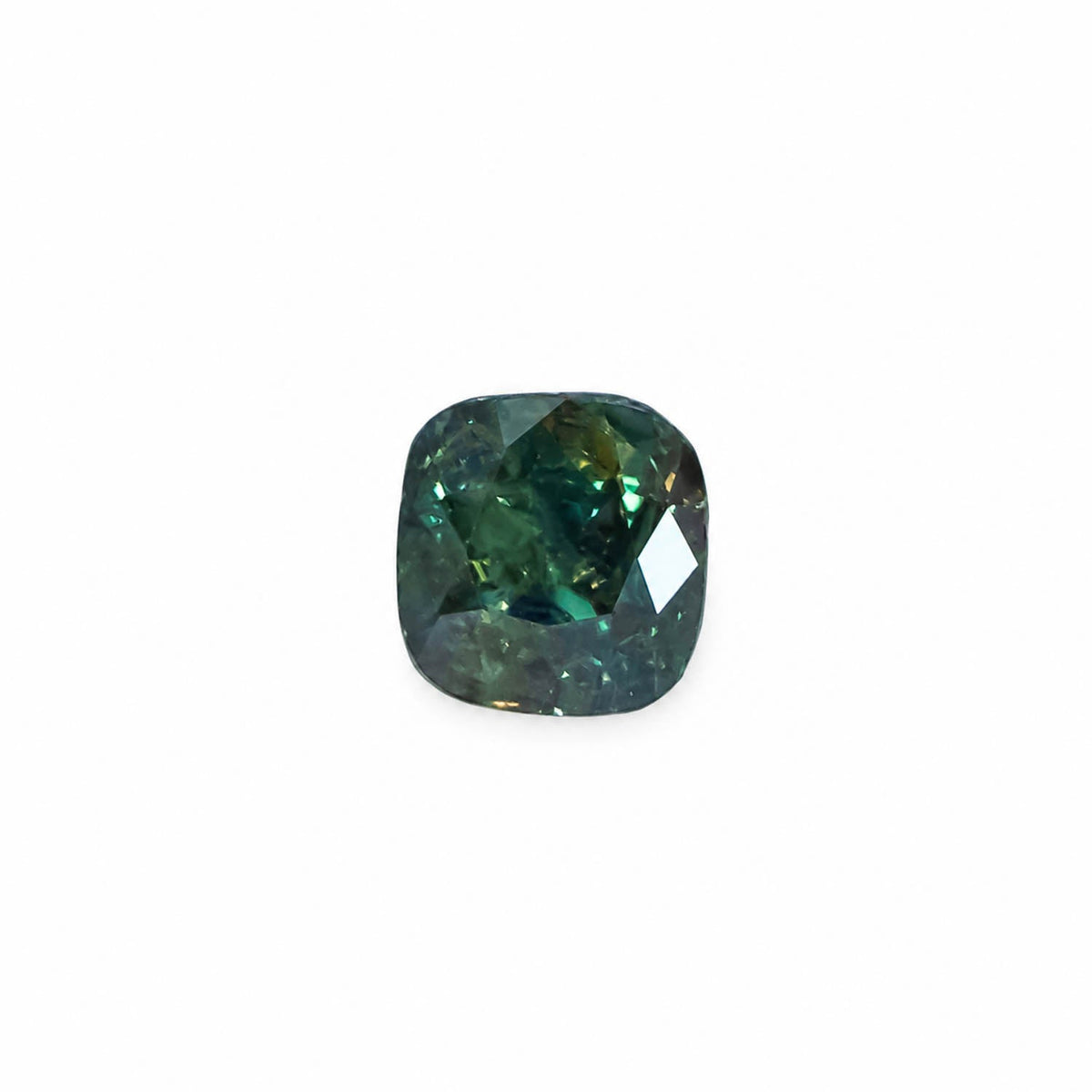 0.90 ct cushion cut alexandrite photographed in daylight