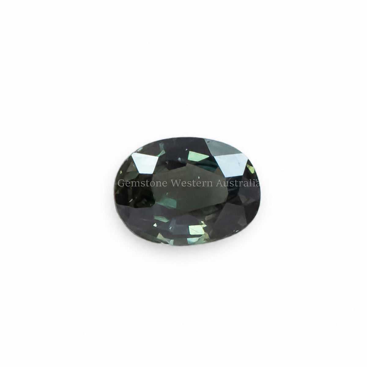 0.75 ct oval cut alexandrite photographed in daylight