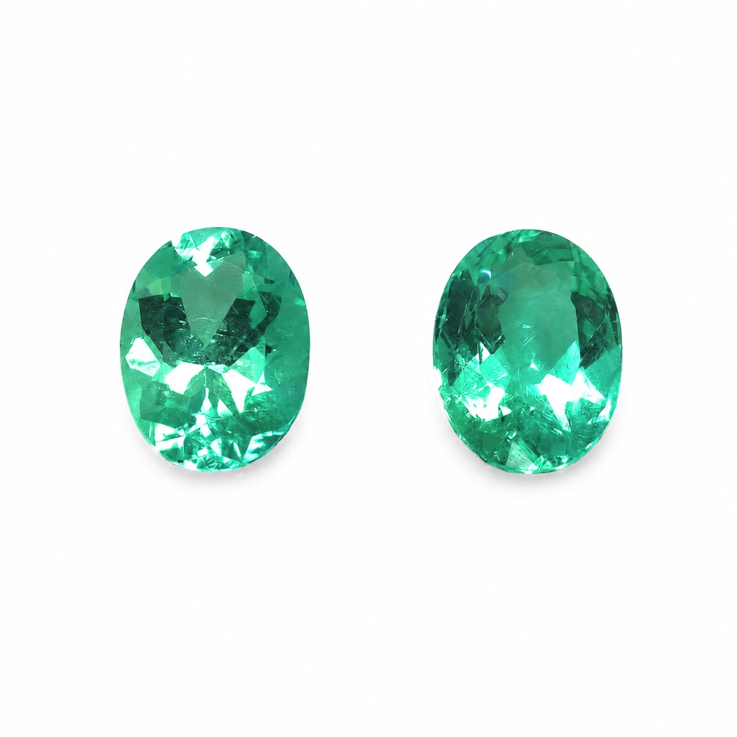 front view of Matched Pair of Natural Colombian Emeralds – Oval Cut 4.30CT Total in white background