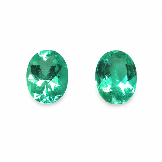 front view of Matched Pair of Natural Colombian Emeralds – Oval Cut 4.30CT Total in white background