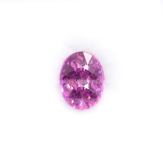 Front view of 1.01 Ct Natural Pink Sapphire Loose Gemstone Oval Cut in white background.
