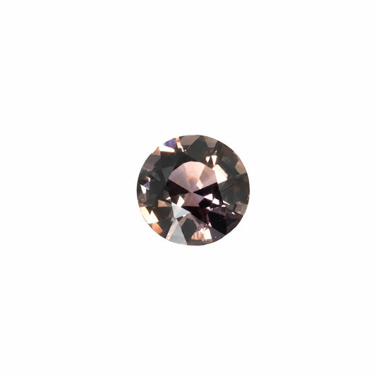 1.03 ct natural unheated colour change sapphire, round mixed cut, shown in cool light
