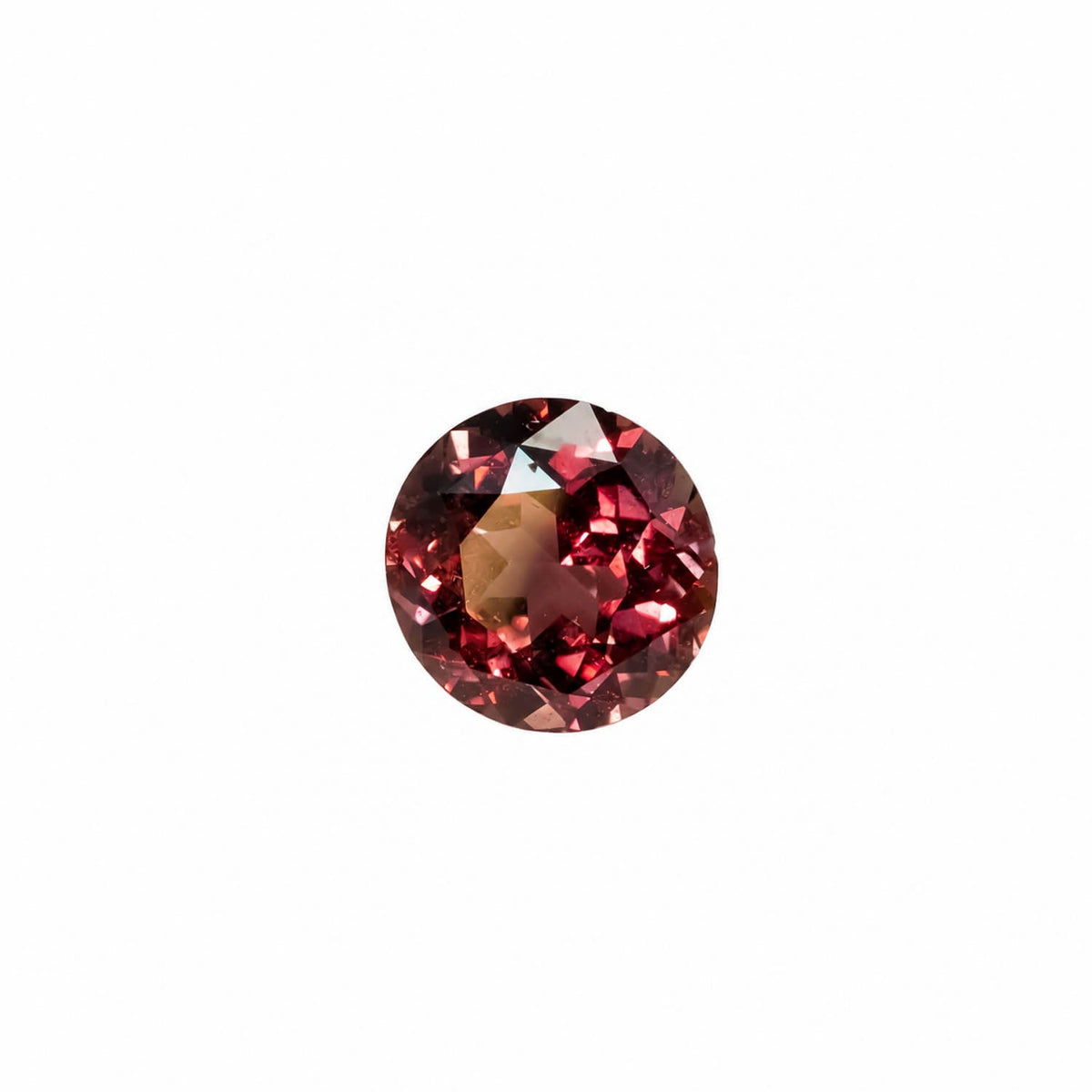 1.89 ct natural unheated colour change brown-red sapphire, round mixed cut
