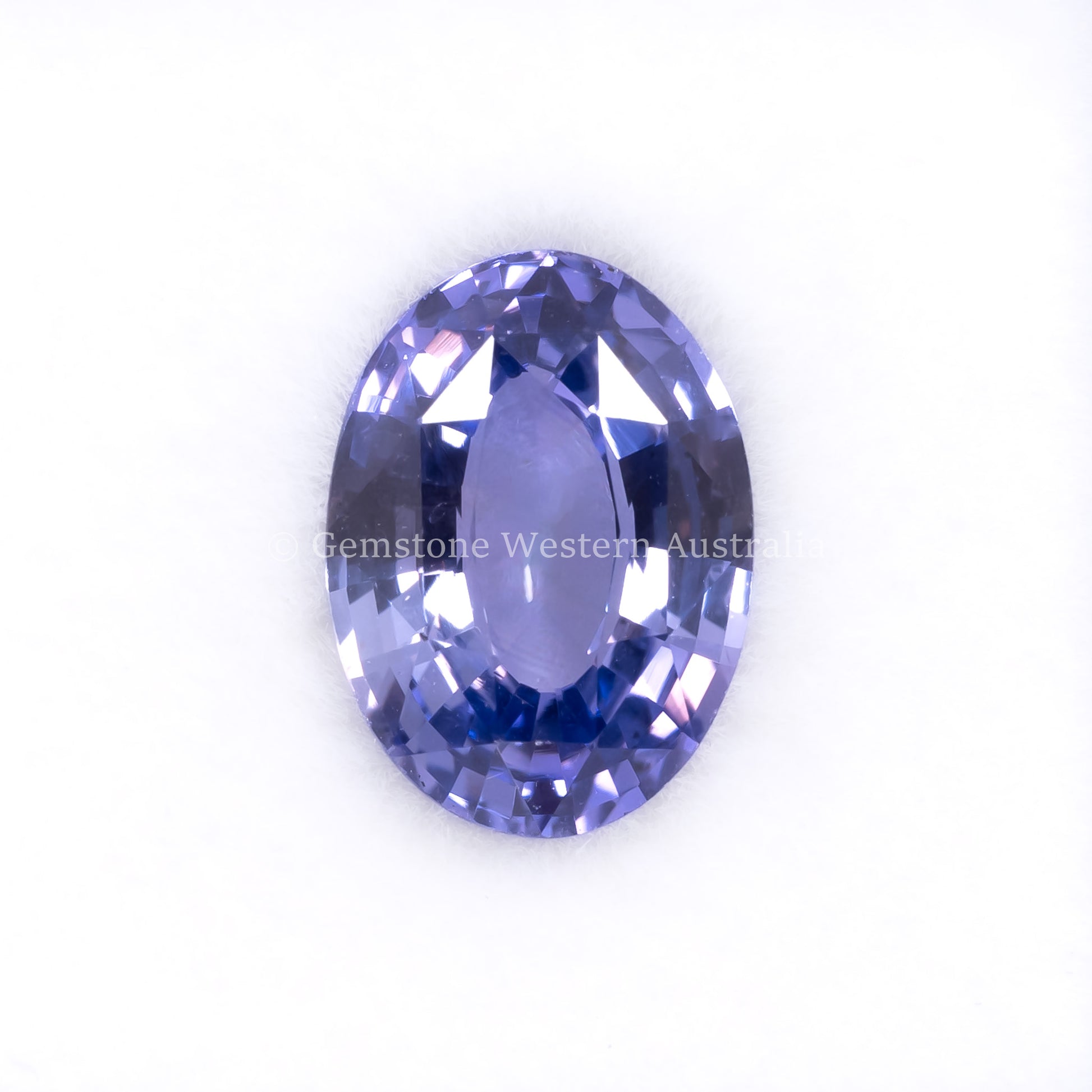 Front view of 2.81CT Natural Unheated Violet Sapphire – Oval Mixed Cut in white background.