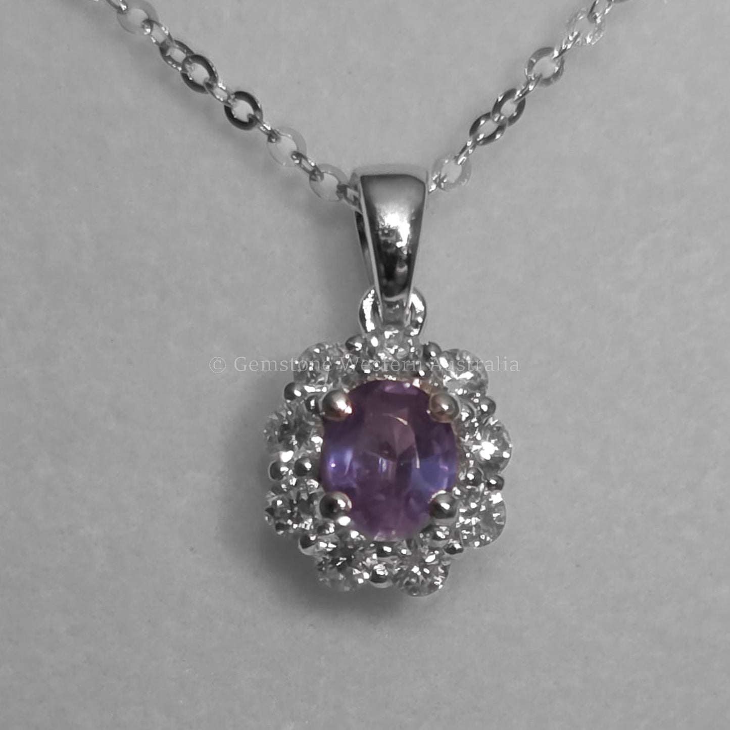 Oval Alexandrite Pendant with Diamond Halo in Platinum