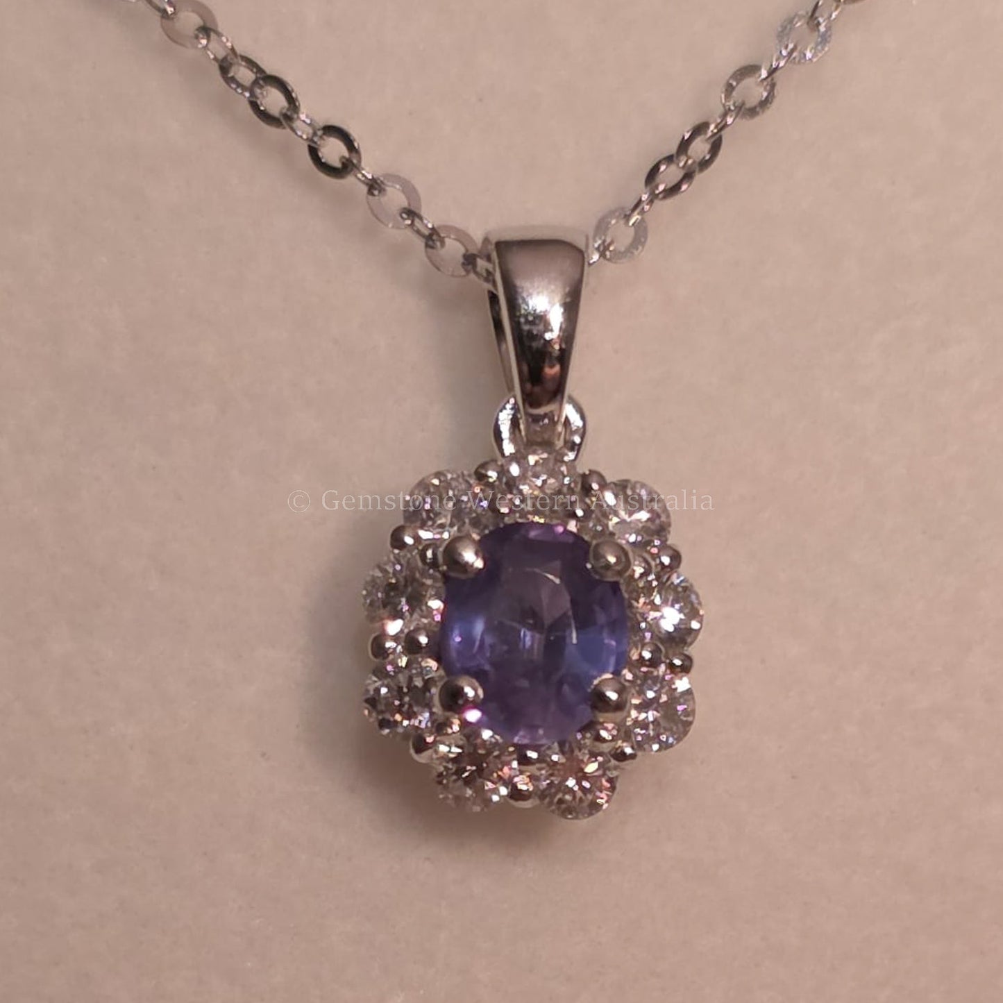 Oval Alexandrite Pendant with Diamond Halo in Platinum