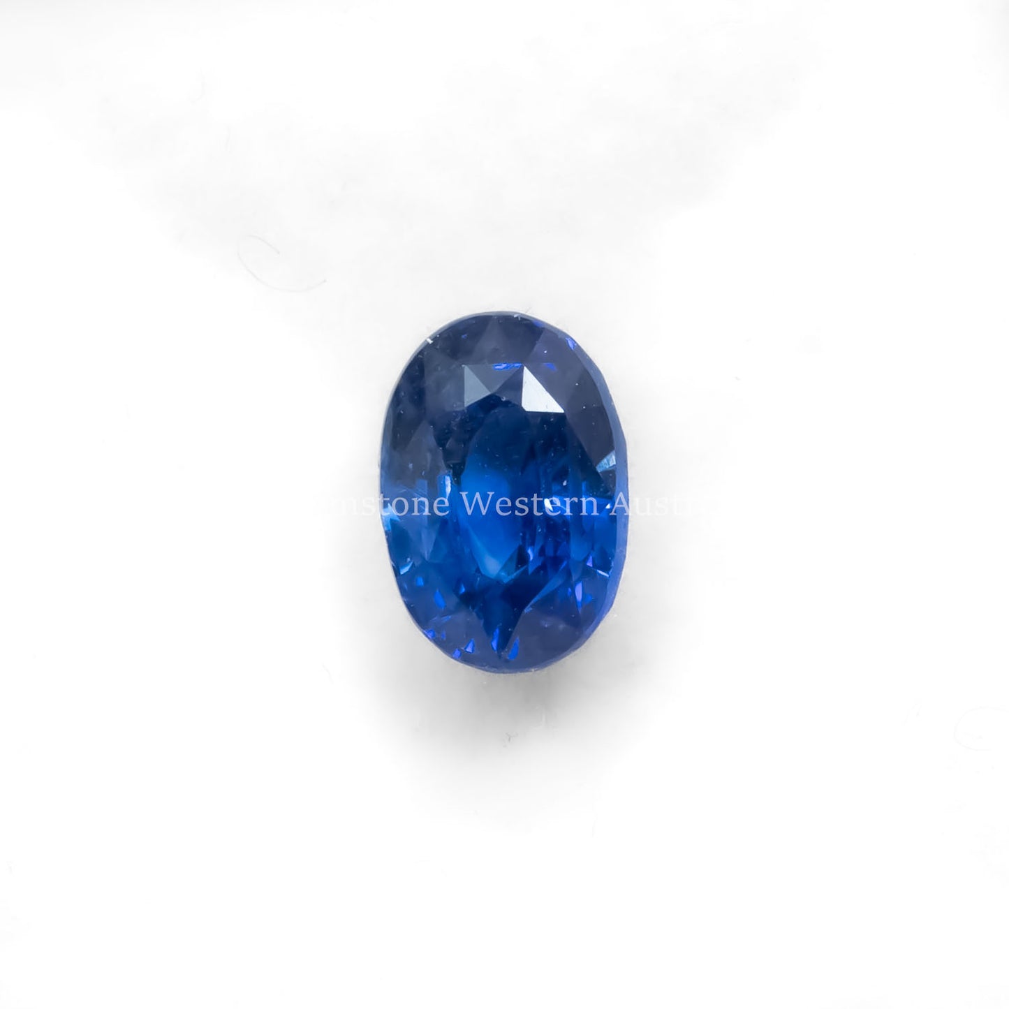 Front view of 2.53CT NATURAL VIVID ROYAL BLUE SAPPHIRE – OVAL MIXED CUT in white background.