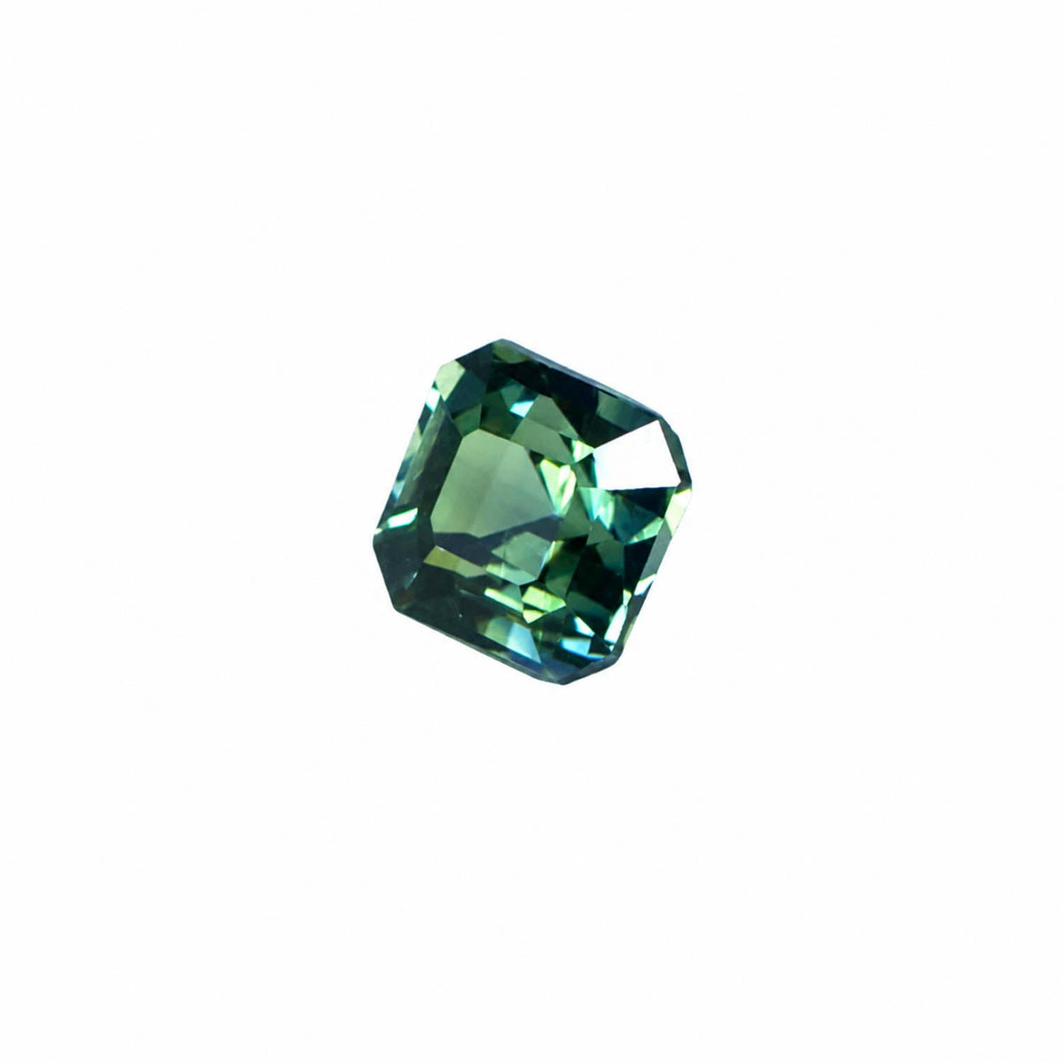 0.69 ct unheated teal green sapphire, second view