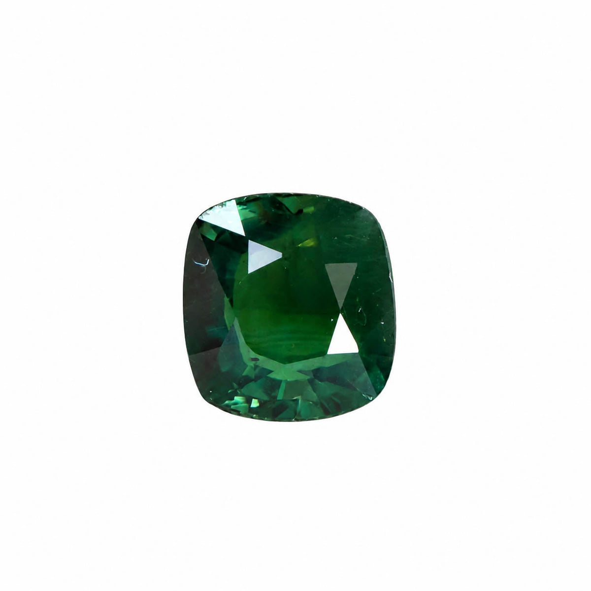 1.60 ct cushion cut alexandrite photographed in daylight