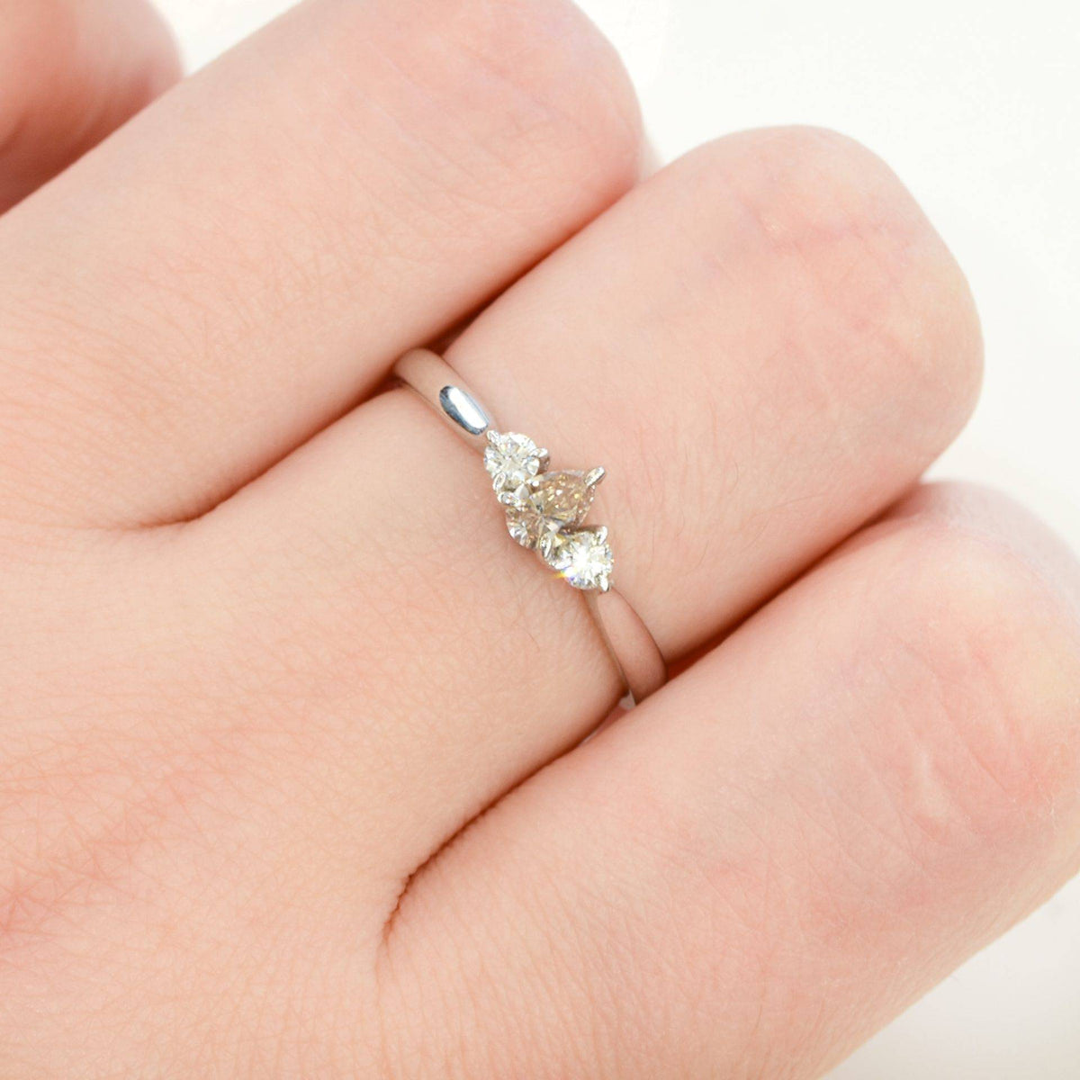 Pear shaped Argyle Pink Diamond Ring with Diamond Accents in 18K Gold