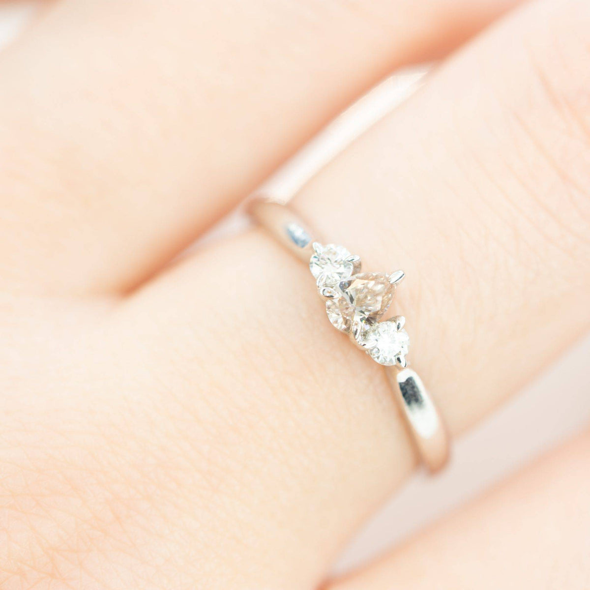 Pear shaped Argyle Pink Diamond Ring with Diamond Accents in 18K Gold