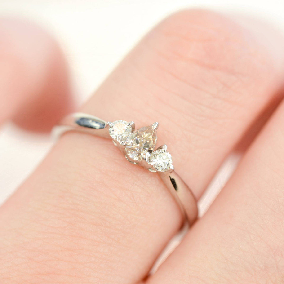 Pear shaped Argyle Pink Diamond Ring with Diamond Accents in 18K Gold