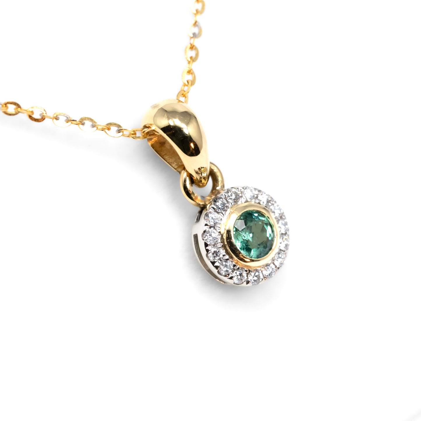 side view of Natural Colombian Emerald and Diamond Halo Pendant in white background