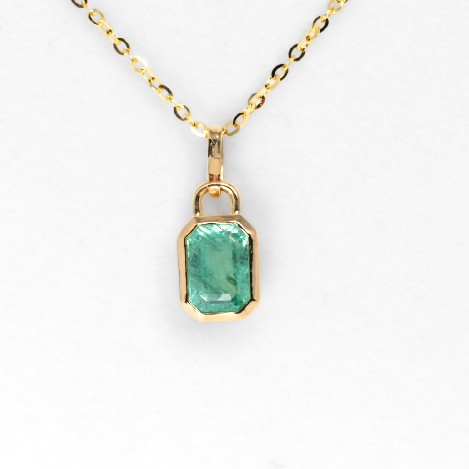 front view of 0.91ct Natural Elongated Emerald Cut Emerald Pendant