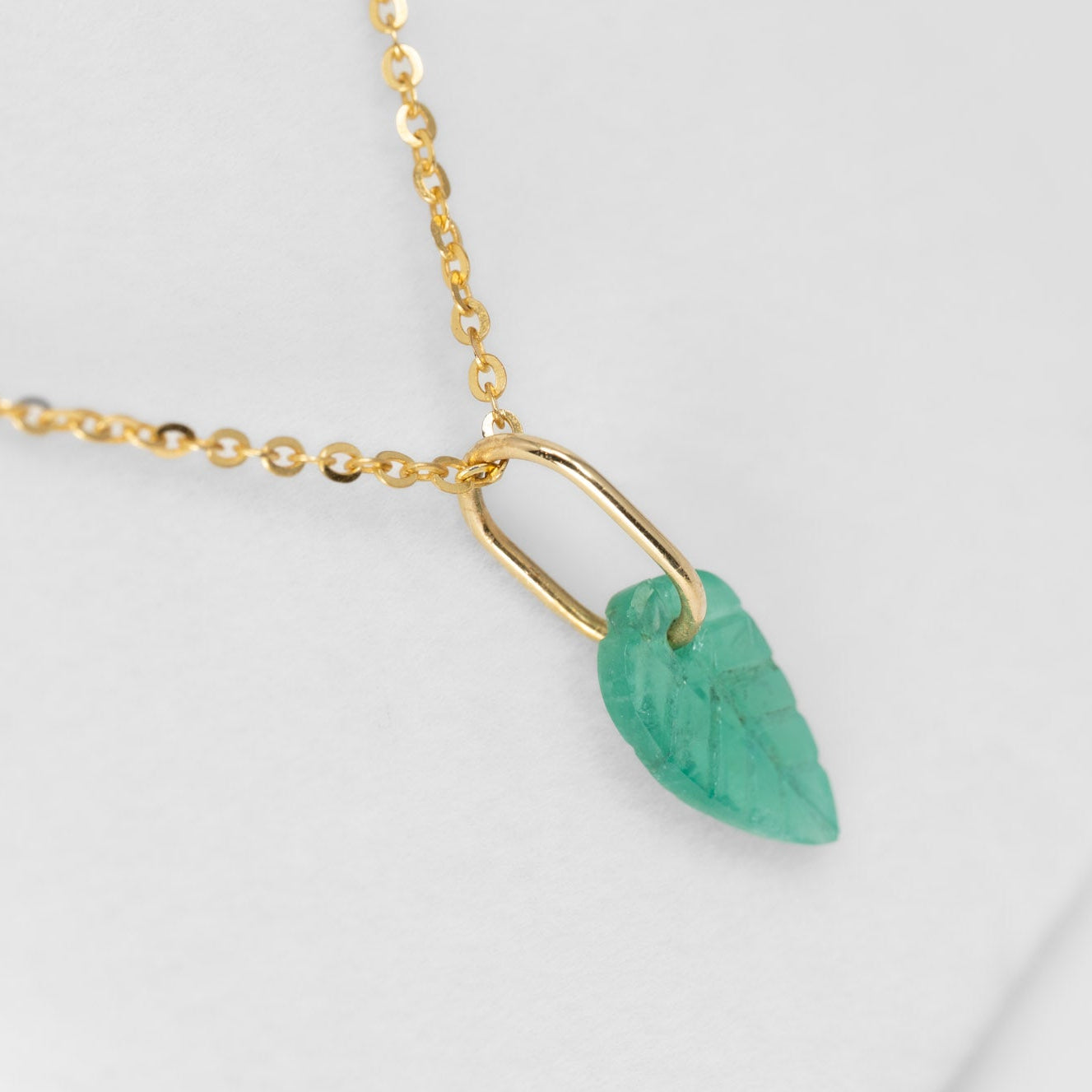 side view of Colombian Emerald Leaf Pendant in white background