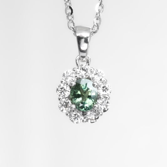 front view of Natural Alexandrite Halo Pendant 0.43ct Oval Cut in Platinum 950 in neutral background