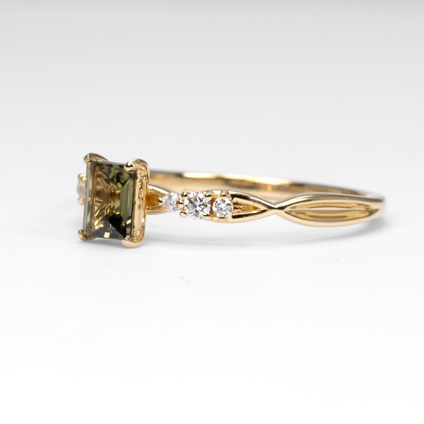 side view of Natural Alexandrite and Diamond Ring 0.38ct Princess Cut in 18K Yellow Gold in white background