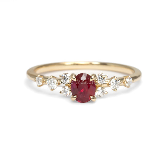 front view of ruby and diamonds gold ring in yellow gold in white background