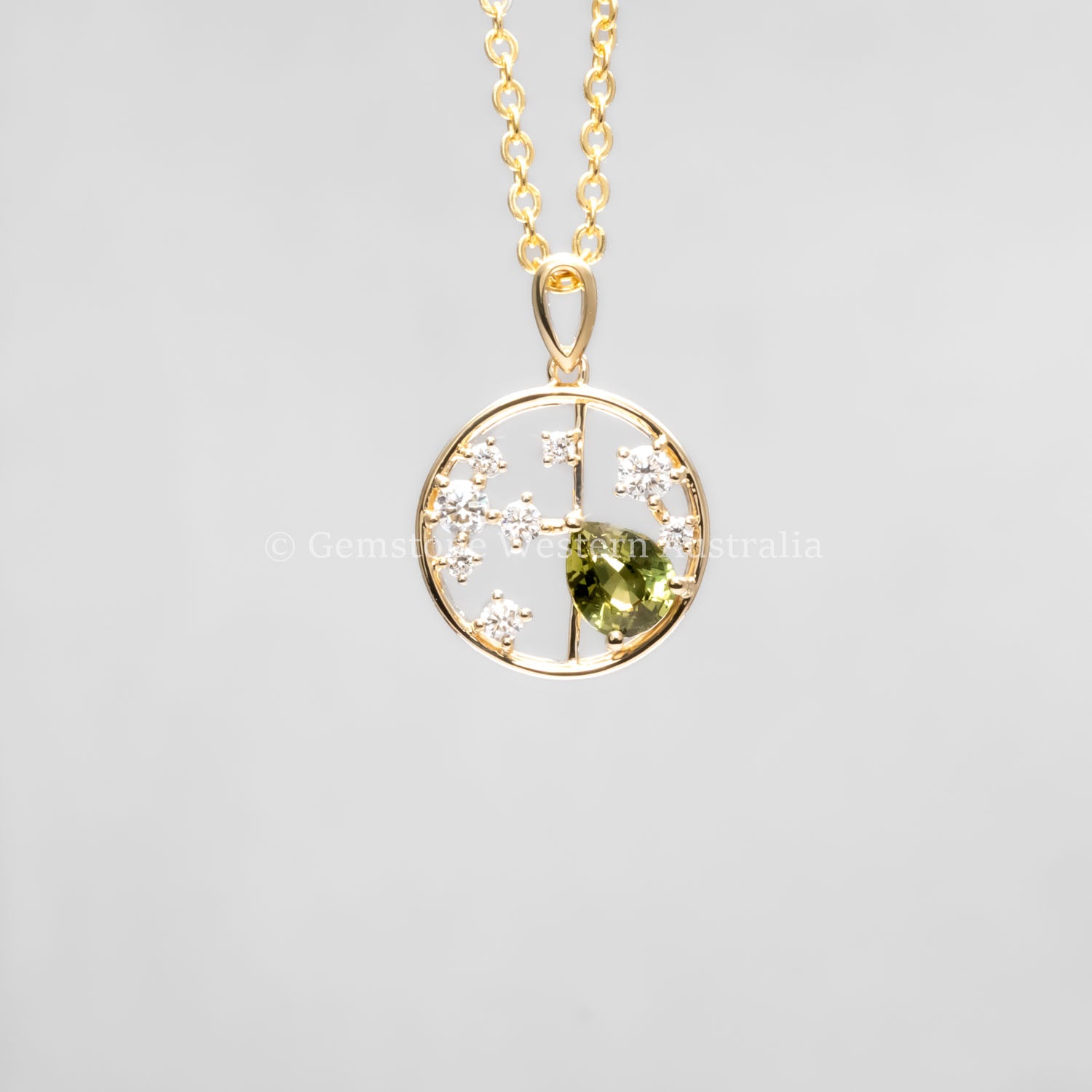 front view of Natural Alexandrite and Diamond Pendant in 18K Yellow Gold – 0.63ct Pear Cut in neutral background