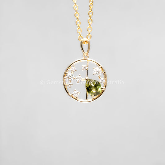 front view of Natural Alexandrite and Diamond Pendant in 18K Yellow Gold – 0.63ct Pear Cut in neutral background