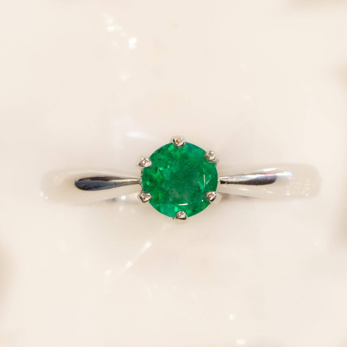 Solitaire Colombian Emerald Ring in Platinum