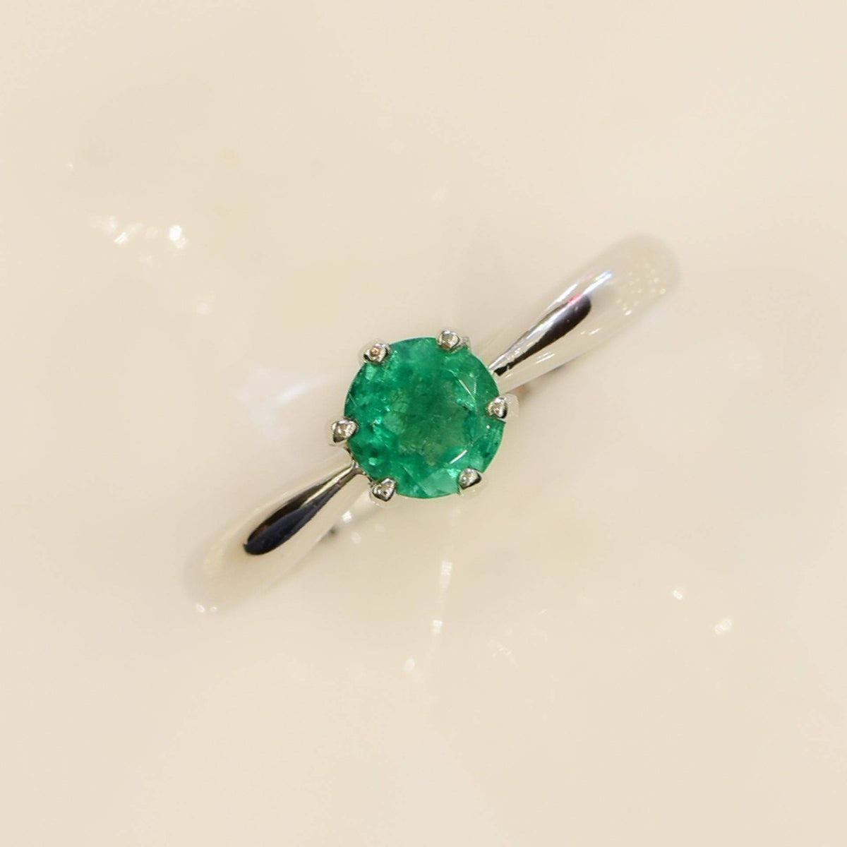 Solitaire Colombian Emerald Ring in Platinum