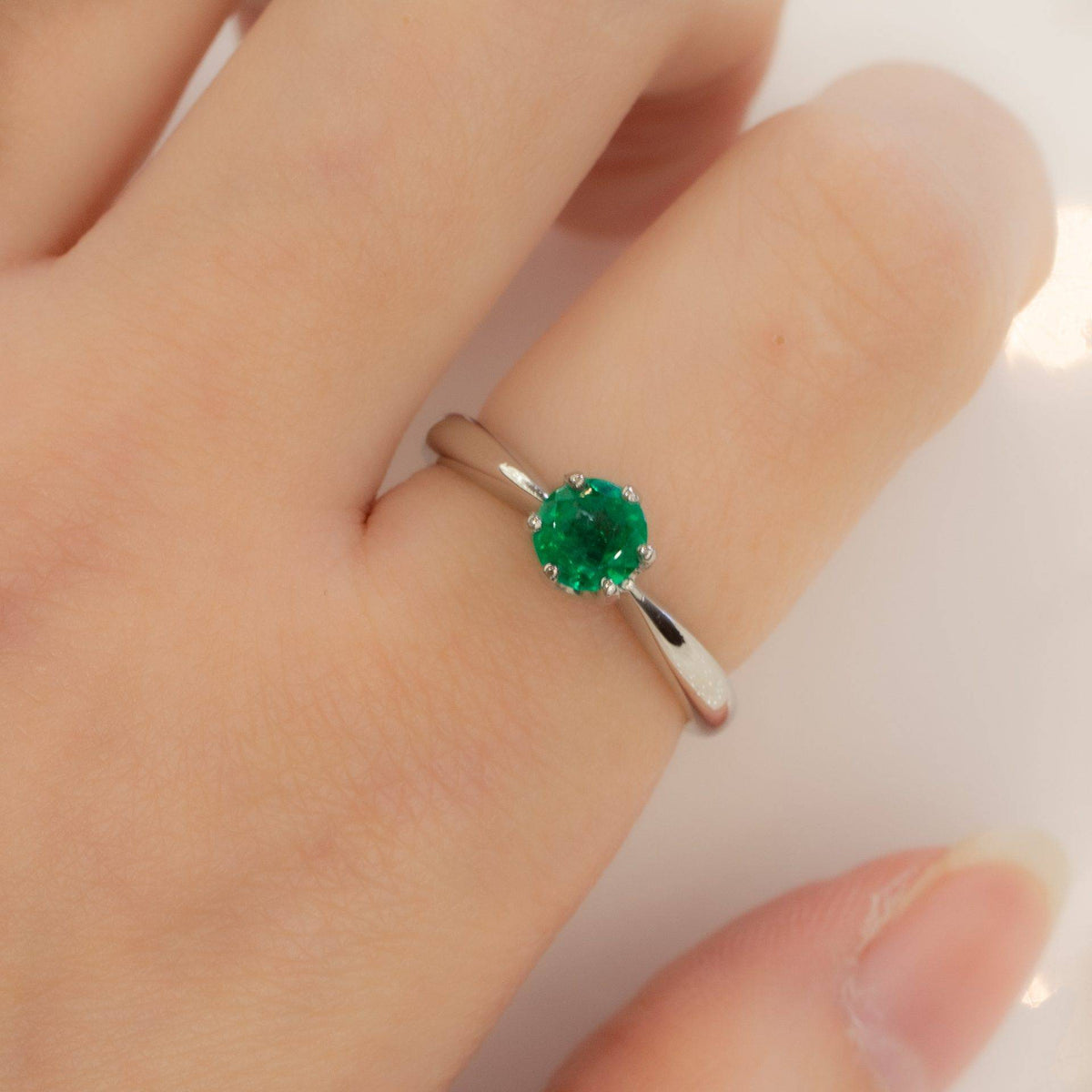 Solitaire Colombian Emerald Ring in Platinum