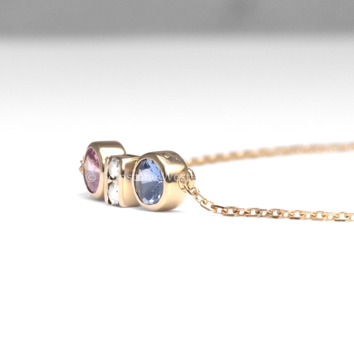 side view of Pink and Blue Sapphire Diamond Bracelet in 18K Yellow Gold in white background