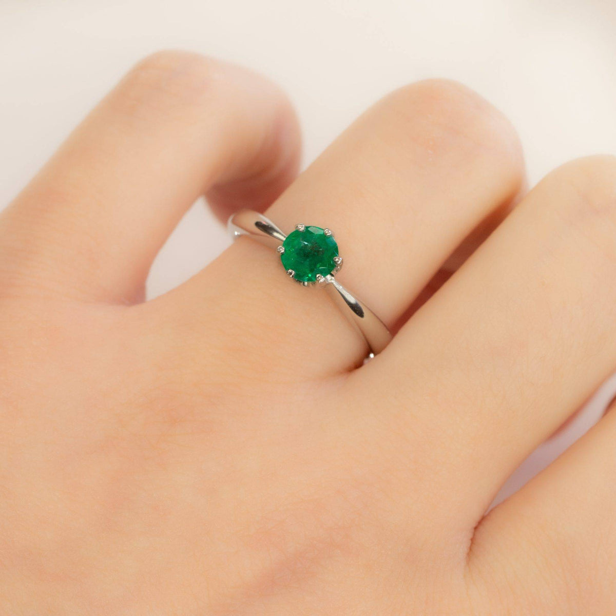 Solitaire Colombian Emerald Ring in Platinum