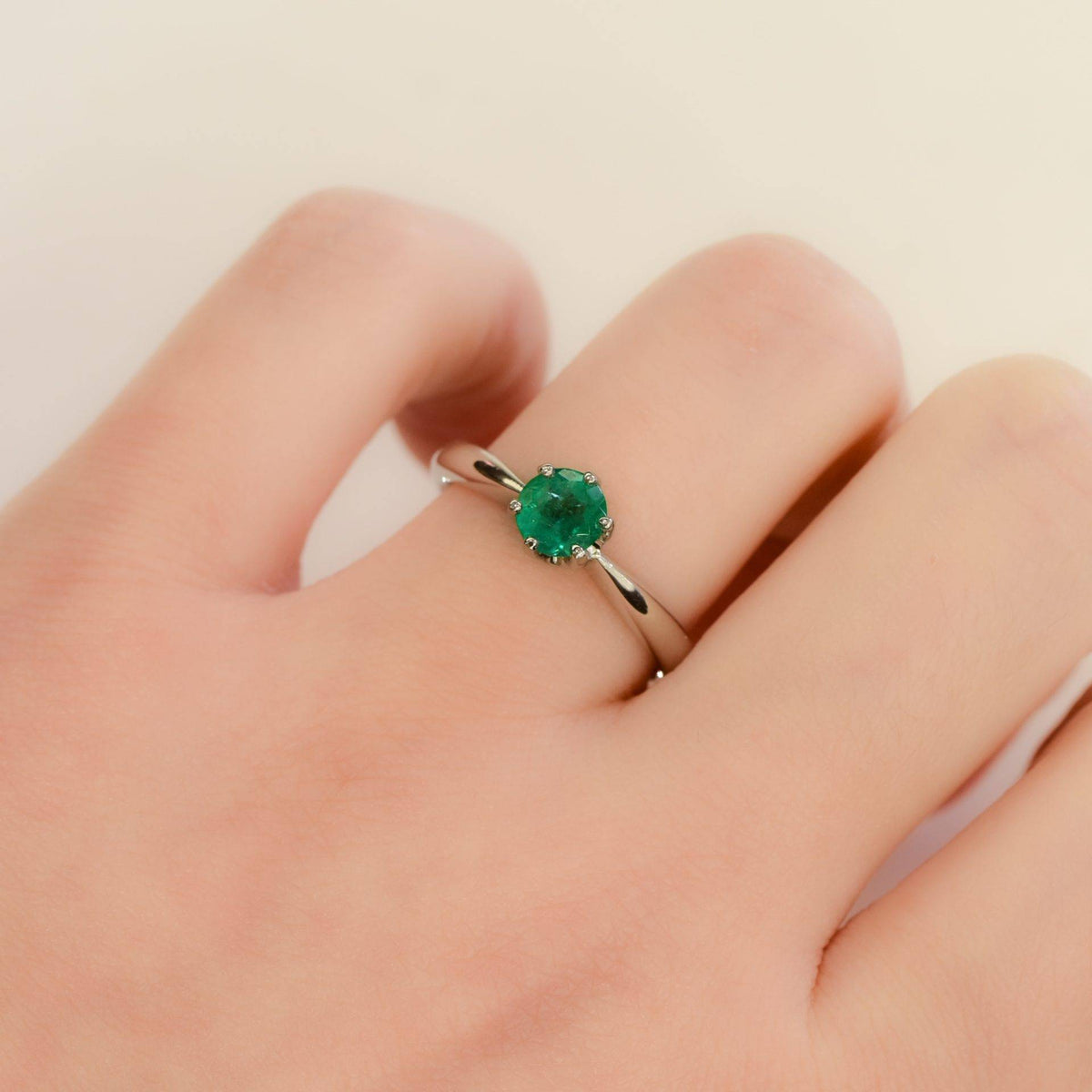 Solitaire Colombian Emerald Ring in Platinum