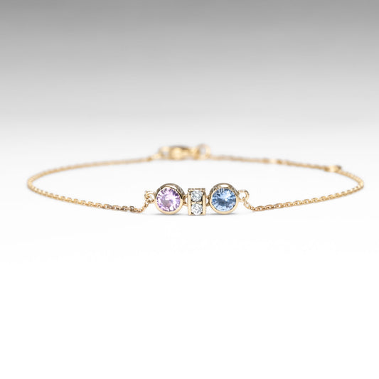 front view of Pink and Blue Sapphire Diamond Bracelet in 18K Yellow Gold in white background