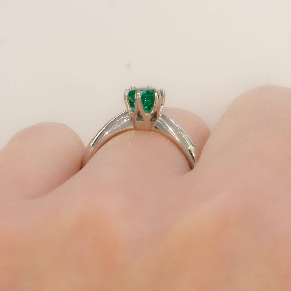 Solitaire Colombian Emerald Ring in Platinum