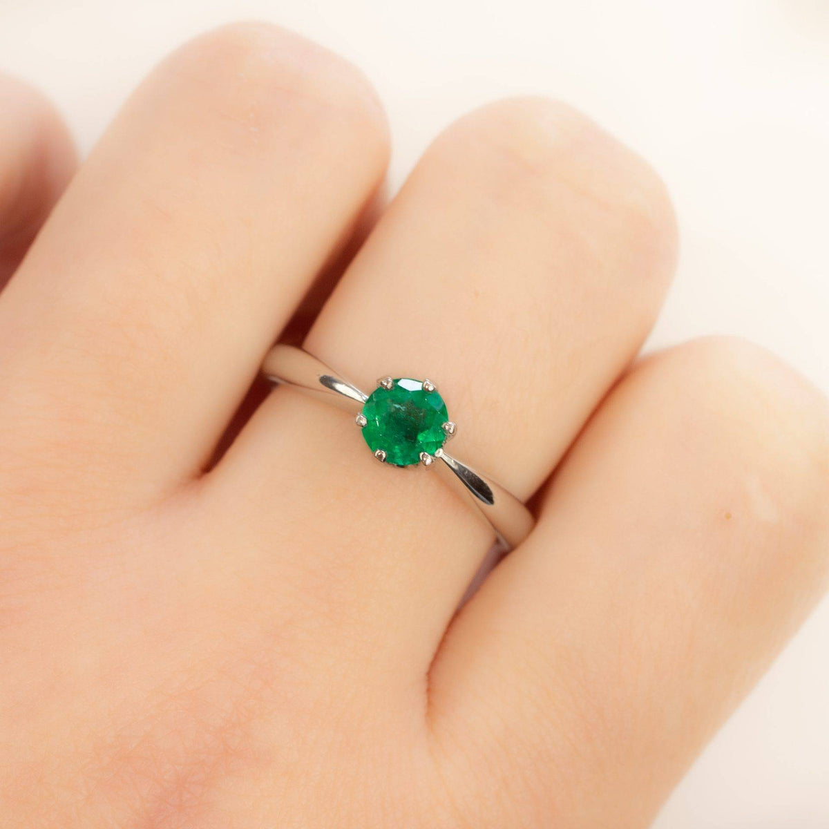 Solitaire Colombian Emerald Ring in Platinum