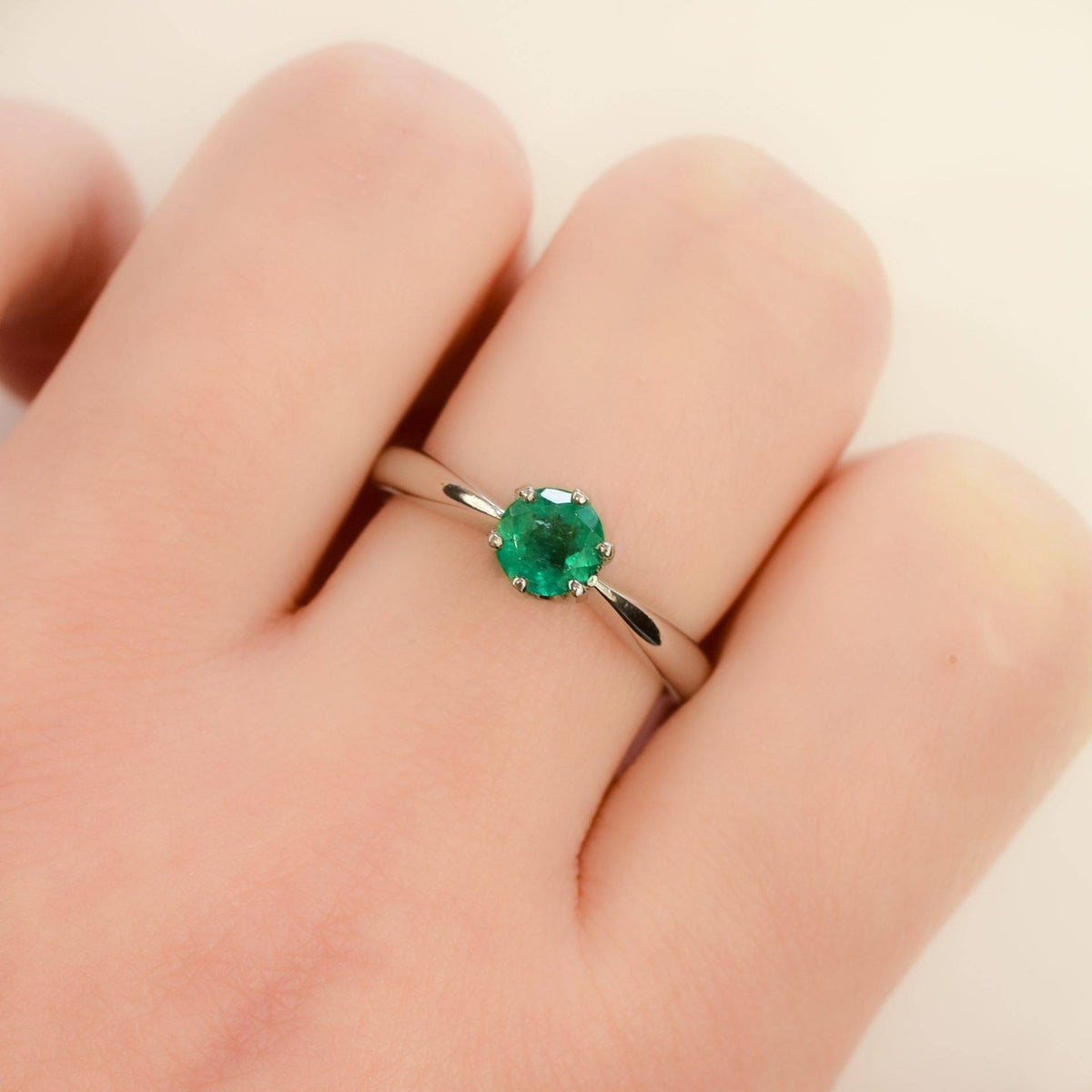 Solitaire Colombian Emerald Ring in Platinum