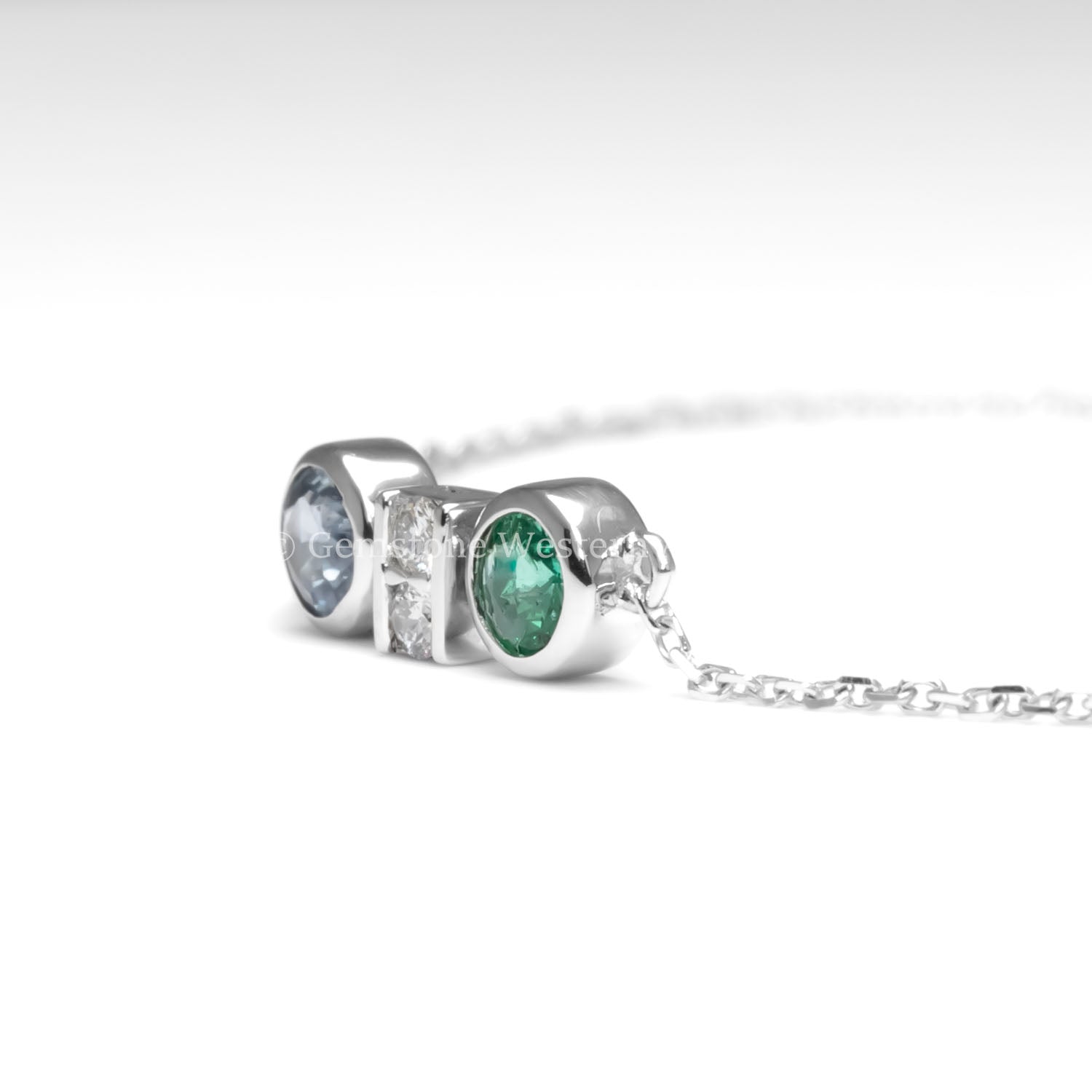side view of Colombian Emerald, Diamond and Blue Sapphire Bracelet in Platinum 950 in white background
