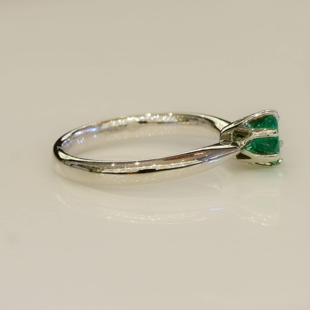 Solitaire Colombian Emerald Ring in Platinum