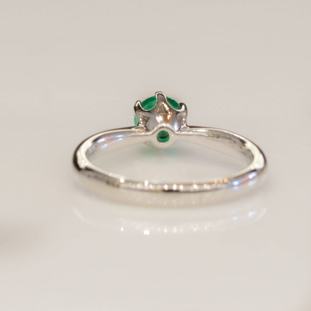 Solitaire Colombian Emerald Ring in Platinum