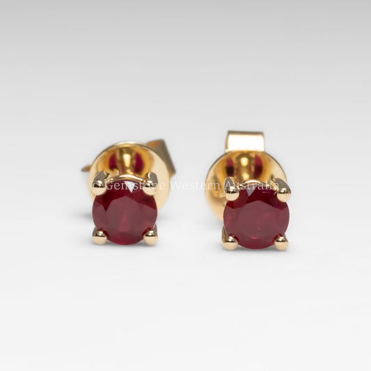 front view of Natural Ruby Stud Earrings in 18K Yellow Gold in white background