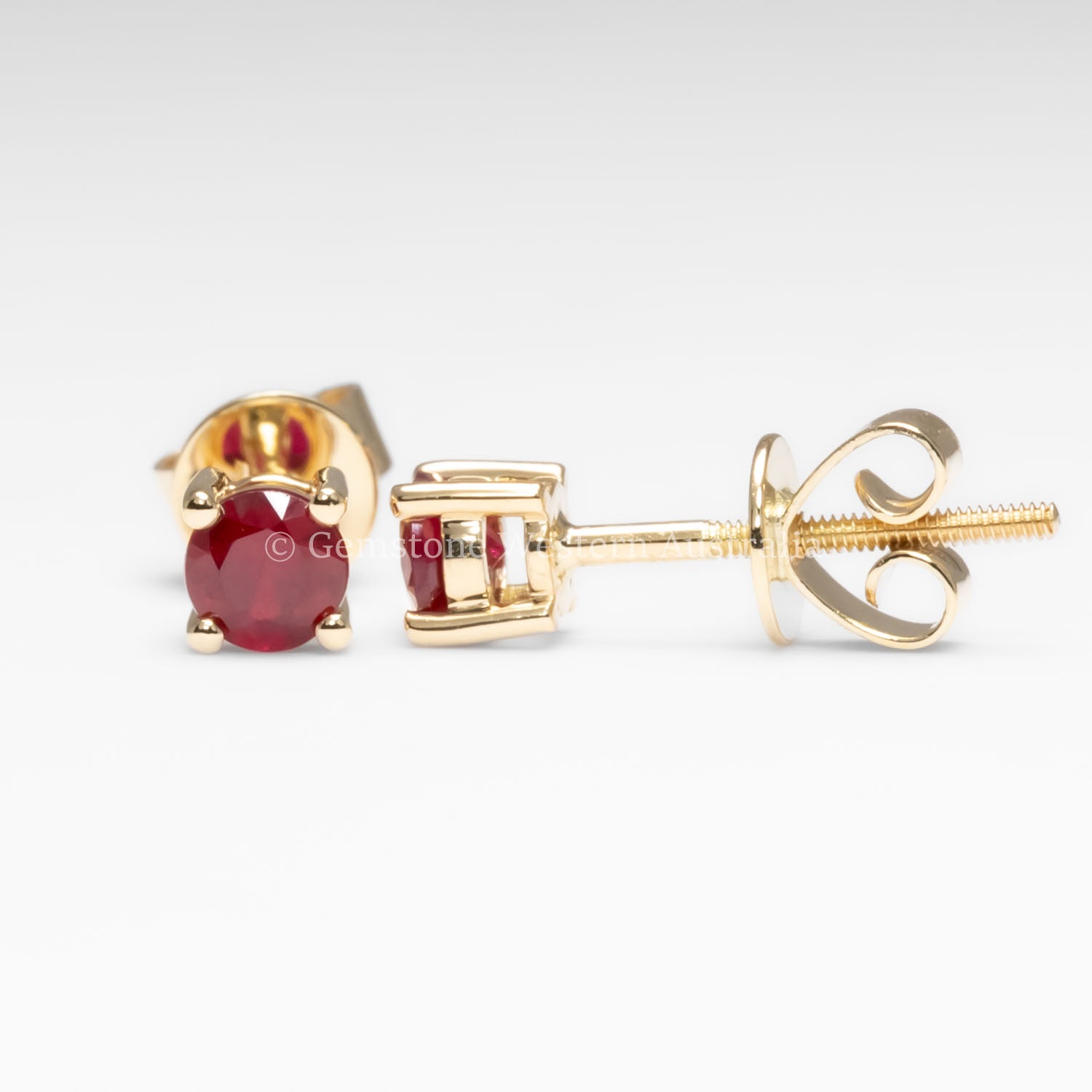 front and side view of Natural Ruby Stud Earrings in 18K Yellow Gold in white background