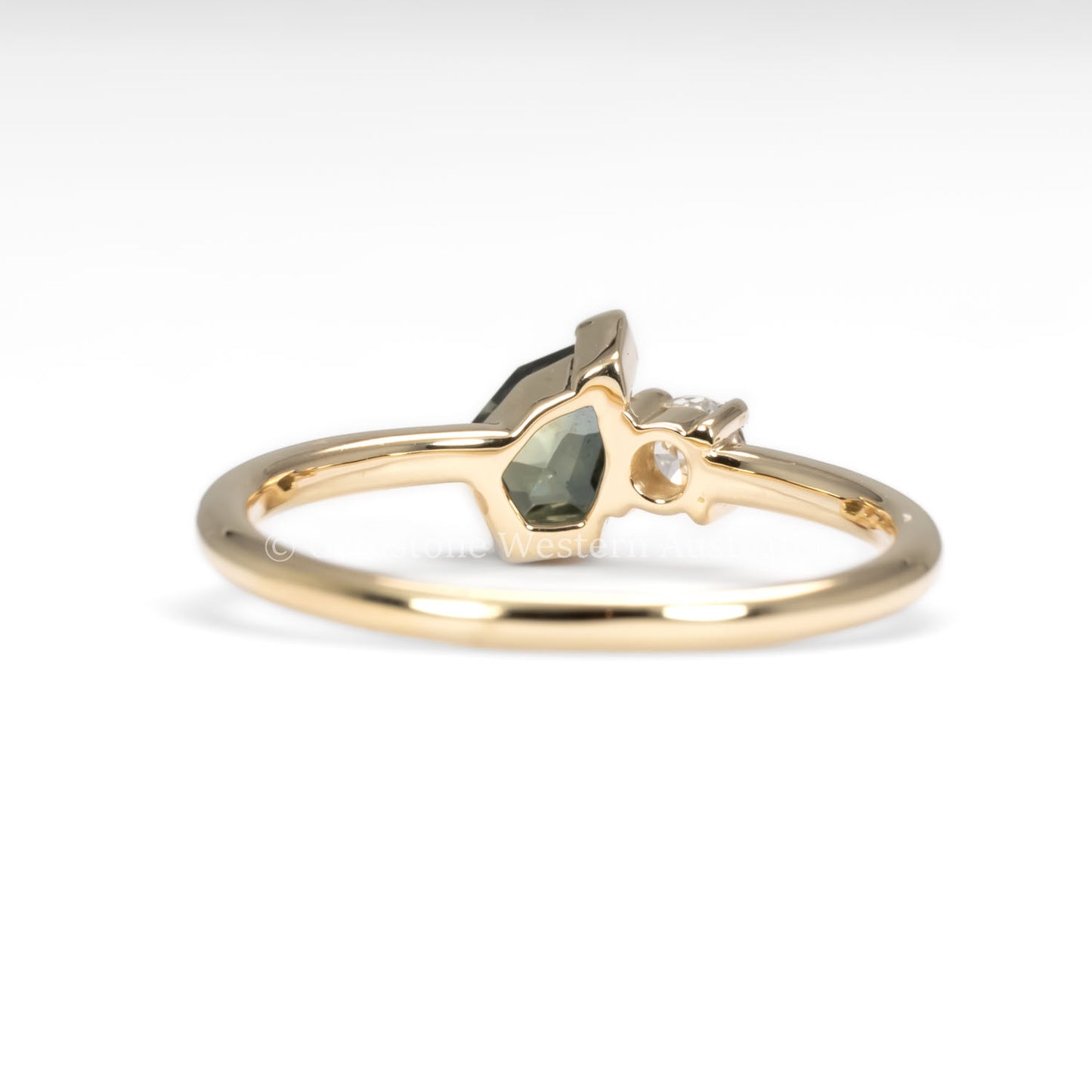 back view of Teal Sapphire and Diamond Toi et Moi Ring in 18K Yellow Gold in white background