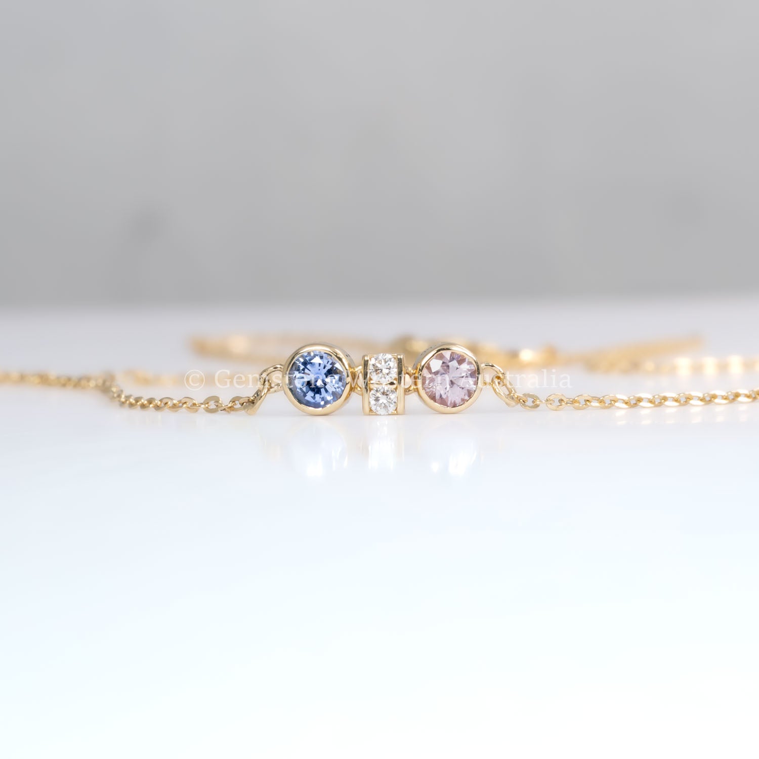 front view of Pink Sapphire & Purple Blue Sapphire Diamond Pendant in 18K Yellow Gold in neutral background