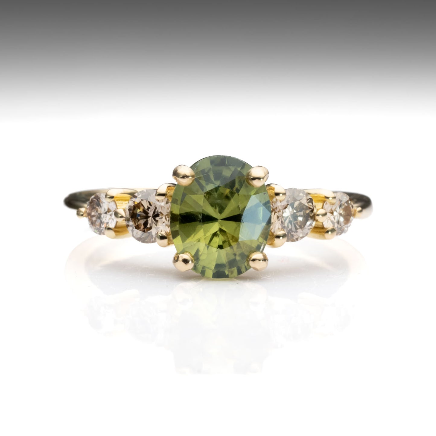 front view of Green Sapphire & Argyle Champagne Diamond Ring