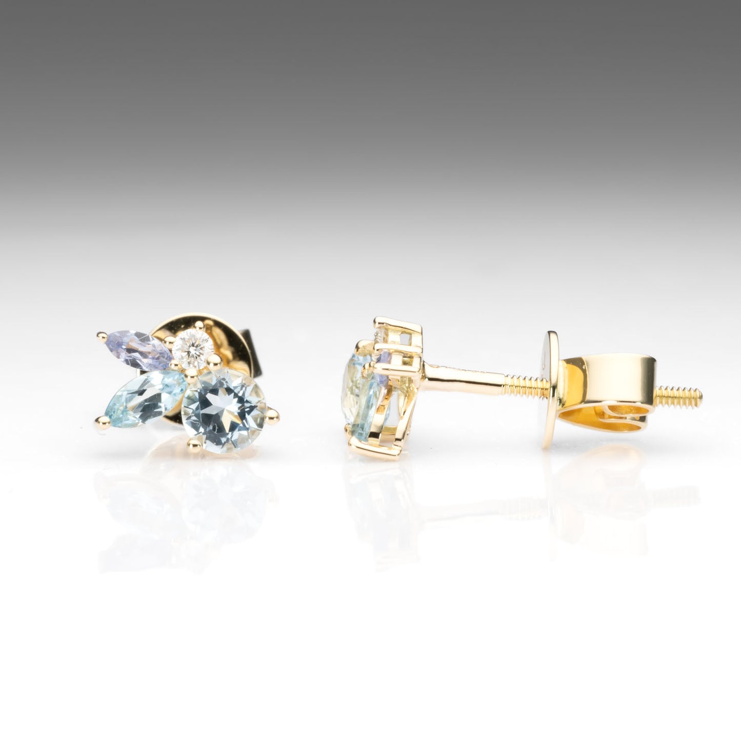front and side view of Aquamarine, Topaz & Tanzanite Diamond Earrings 