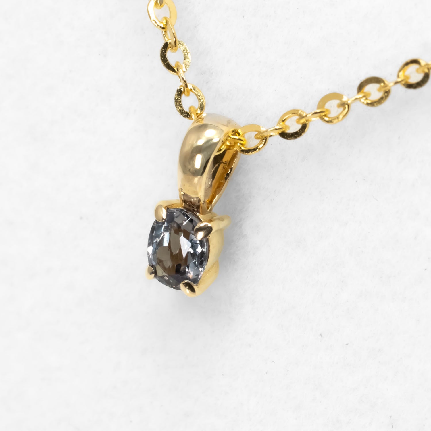 side view of Petite Oval Alexandrite Pendant in 18K Yellow Gold – 0.16ct 