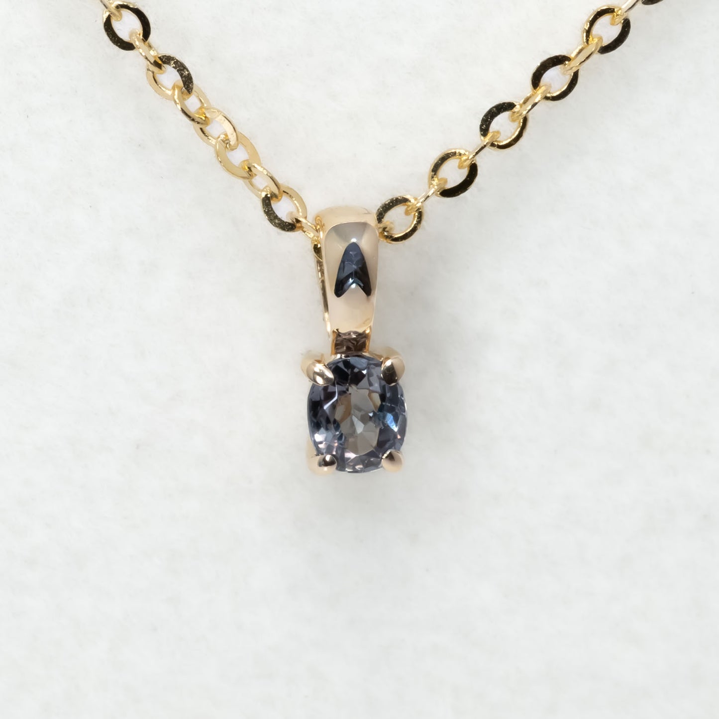 front view of Petite Oval Alexandrite Pendant in 18K Yellow Gold – 0.16ct 
