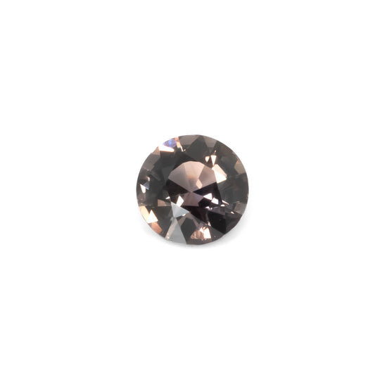 front view of 1.03CT Natural Unheated Colour Change Sapphire – Brown to Red Round Mixed Cut displaying cooler tones