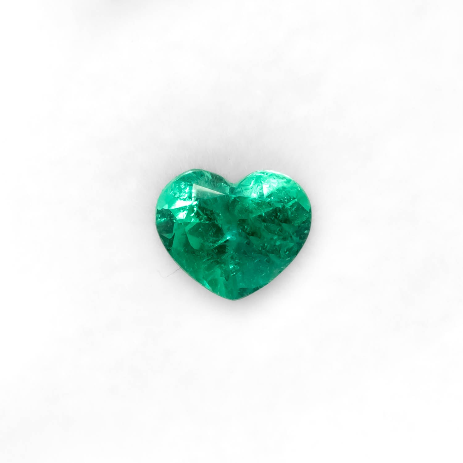 front view of 0.98CT Natural Colombian Emerald – Heart Shape Vivid Green Gemstone