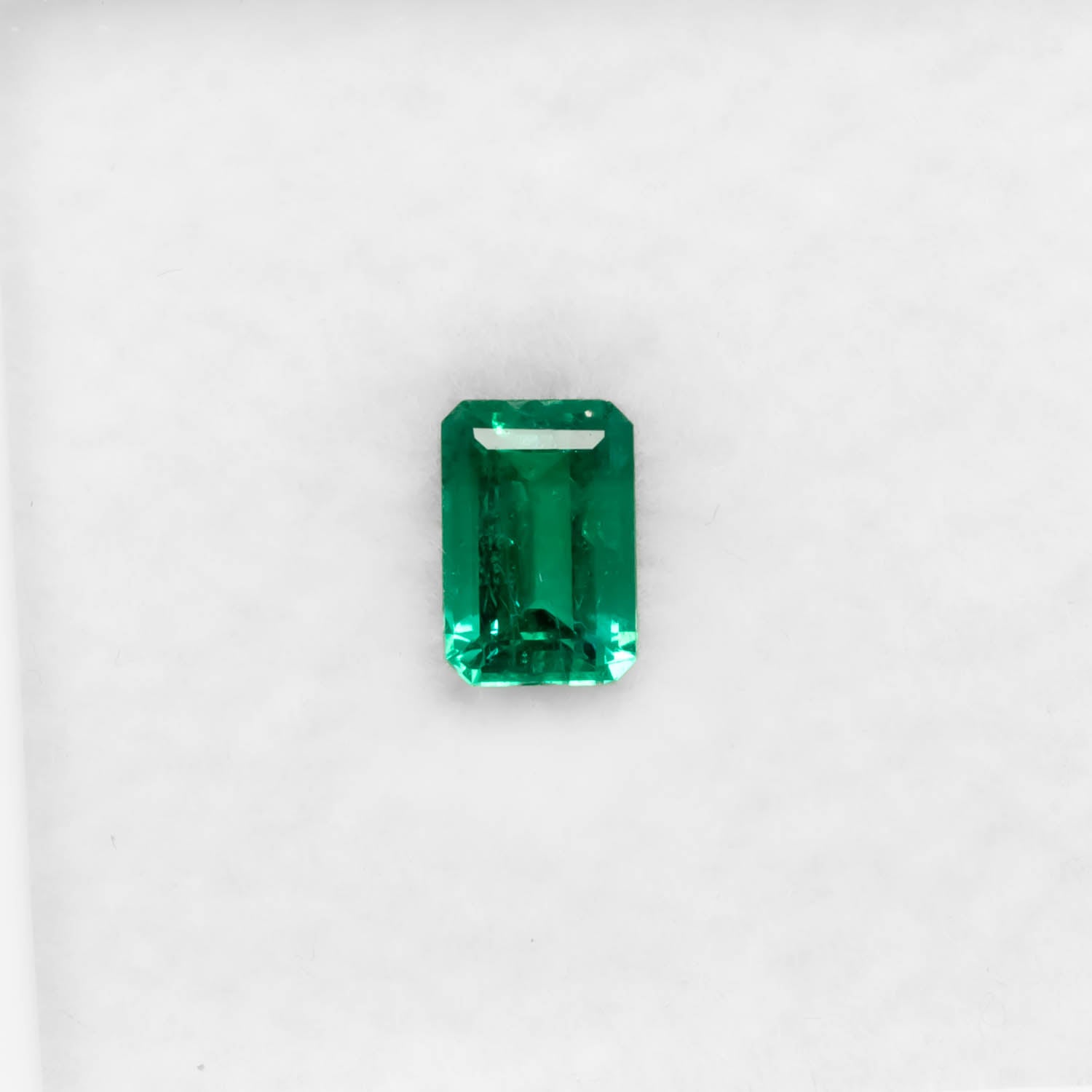 front view of 0.45CT Natural Colombian Emerald – Emerald Cut Fine Green Gemstone