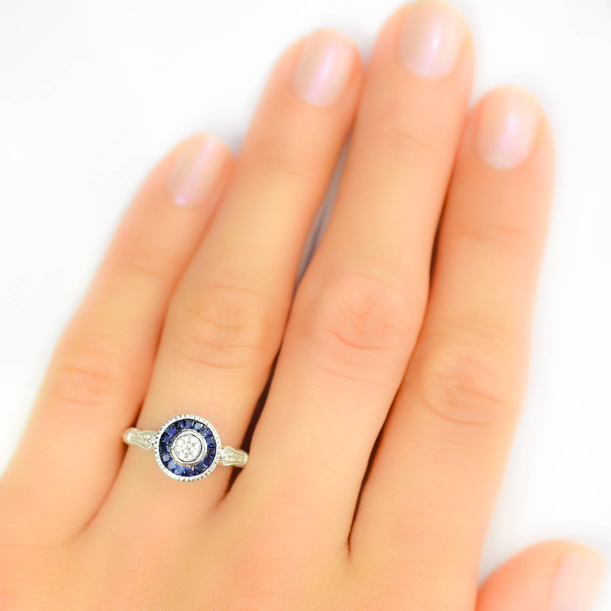 Diamond Ring with Sapphire Halo in 18K Gold
