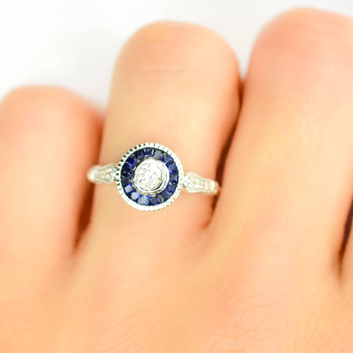 Diamond Ring with Sapphire Halo in 18K Gold